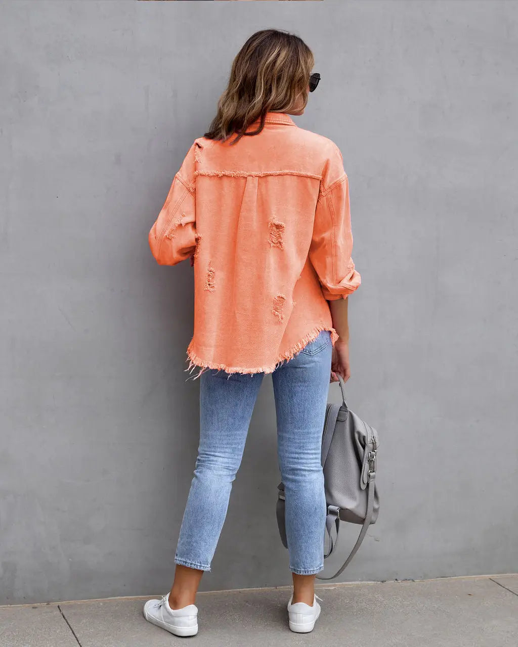 Vibrant distressed denim button-up shirt