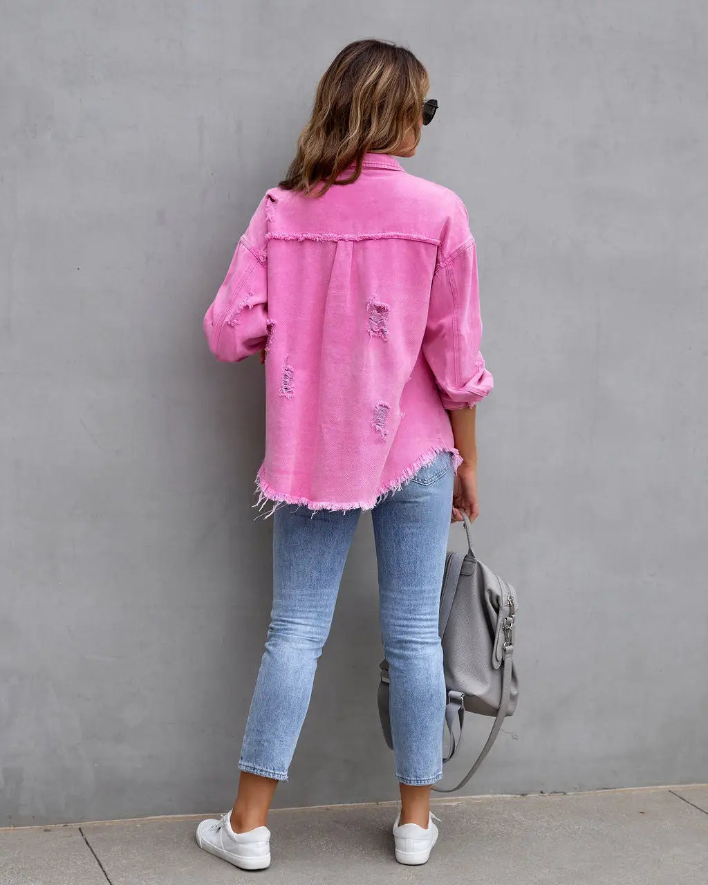 Vibrant distressed denim button-up shirt