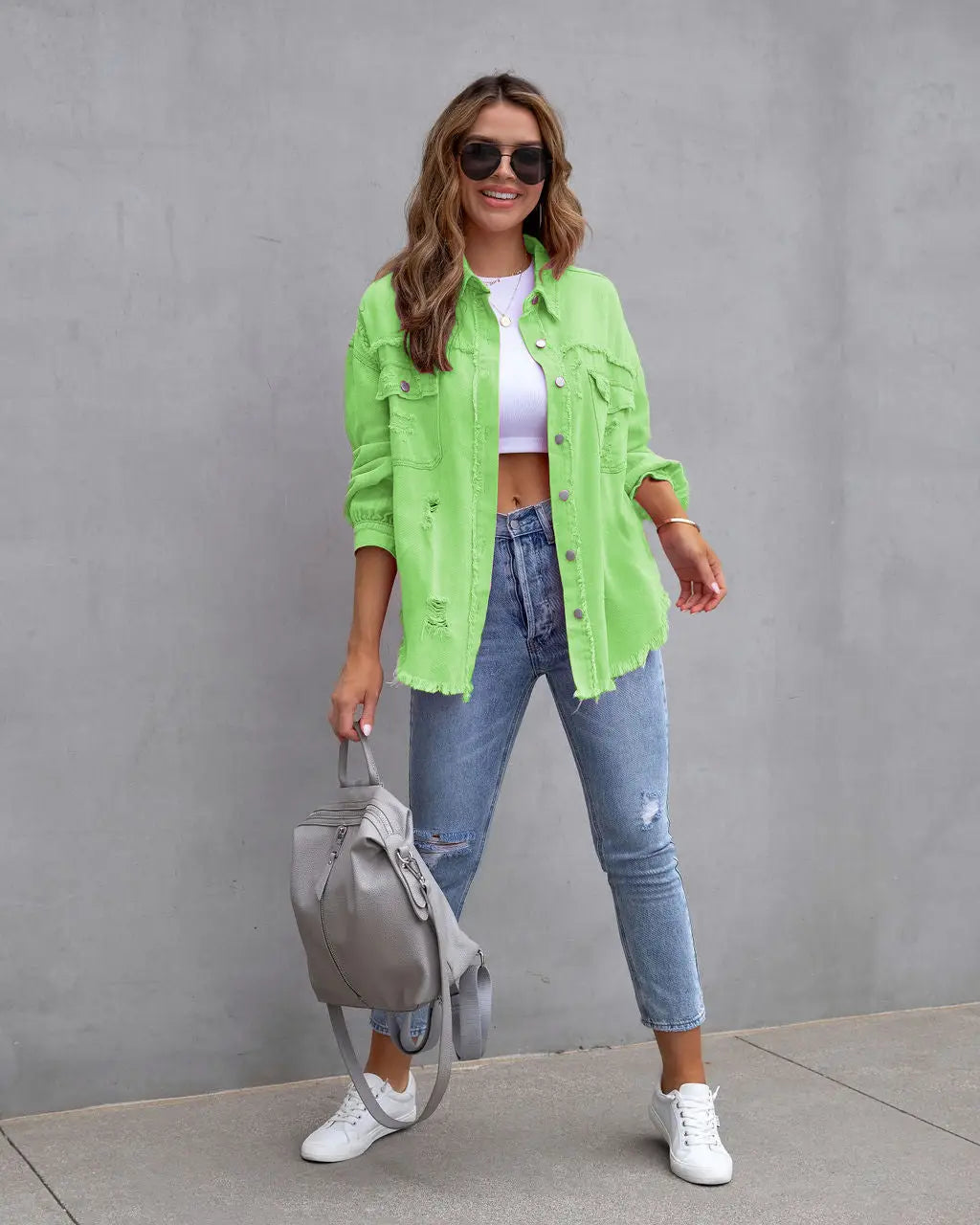 Vibrant distressed denim button-up shirt