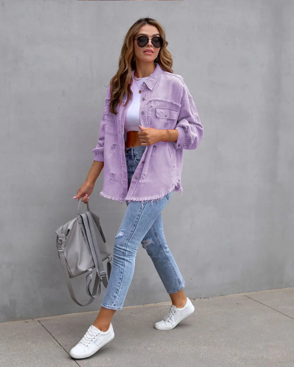 Vibrant distressed denim button-up shirt